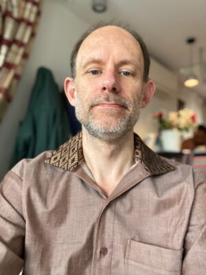 Portrait of Raphael Hoermann wearing a shirt
